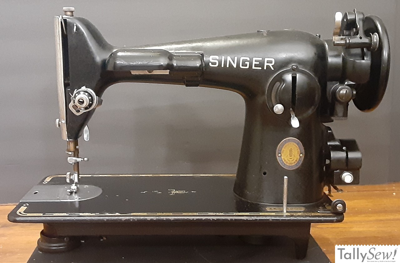Singer 201-2 with Centennial badge