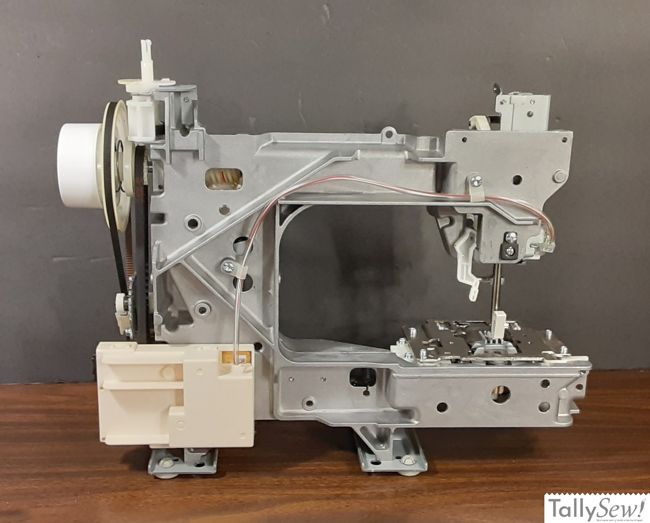 Brother JX2517 sewing machine with its outer plastic shell removed, Photo taken from the back of the machine
