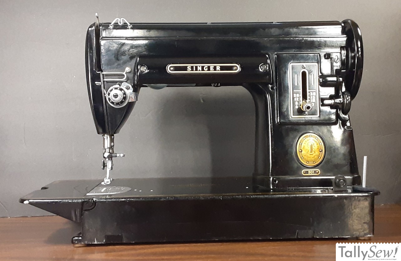 A Singer 301A sewing machine, a straight stitch model known for introducing the slant shank presser foot.