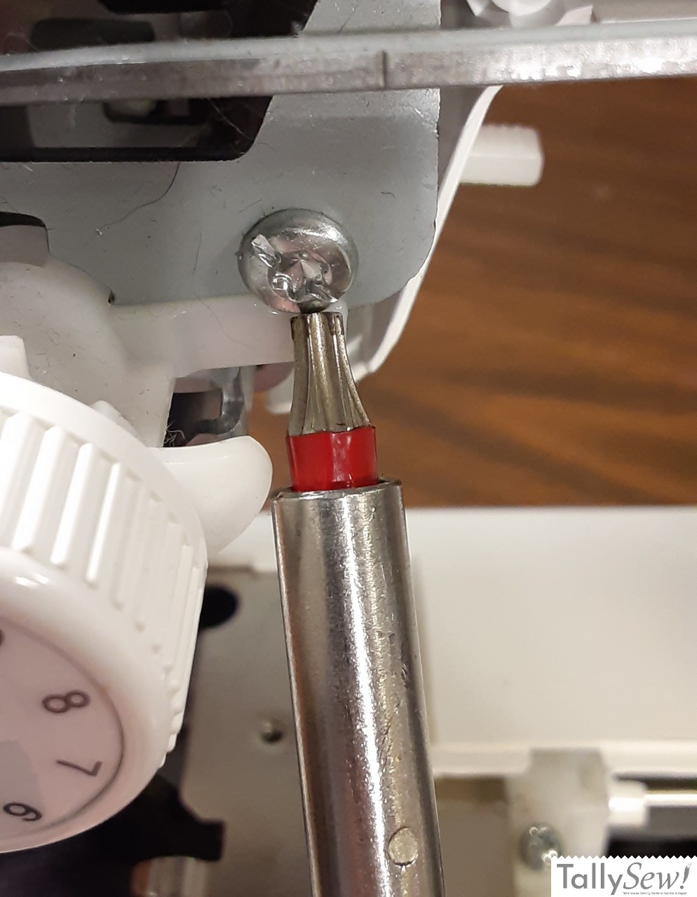 Photo of the Torx bit used to remove the tensioner bracket from a Brother JX2517 sewing machine