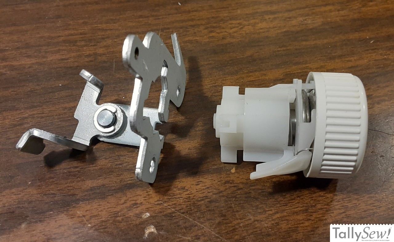 Brother JX2517 tensioner and tensioner bracket both removed from the machine