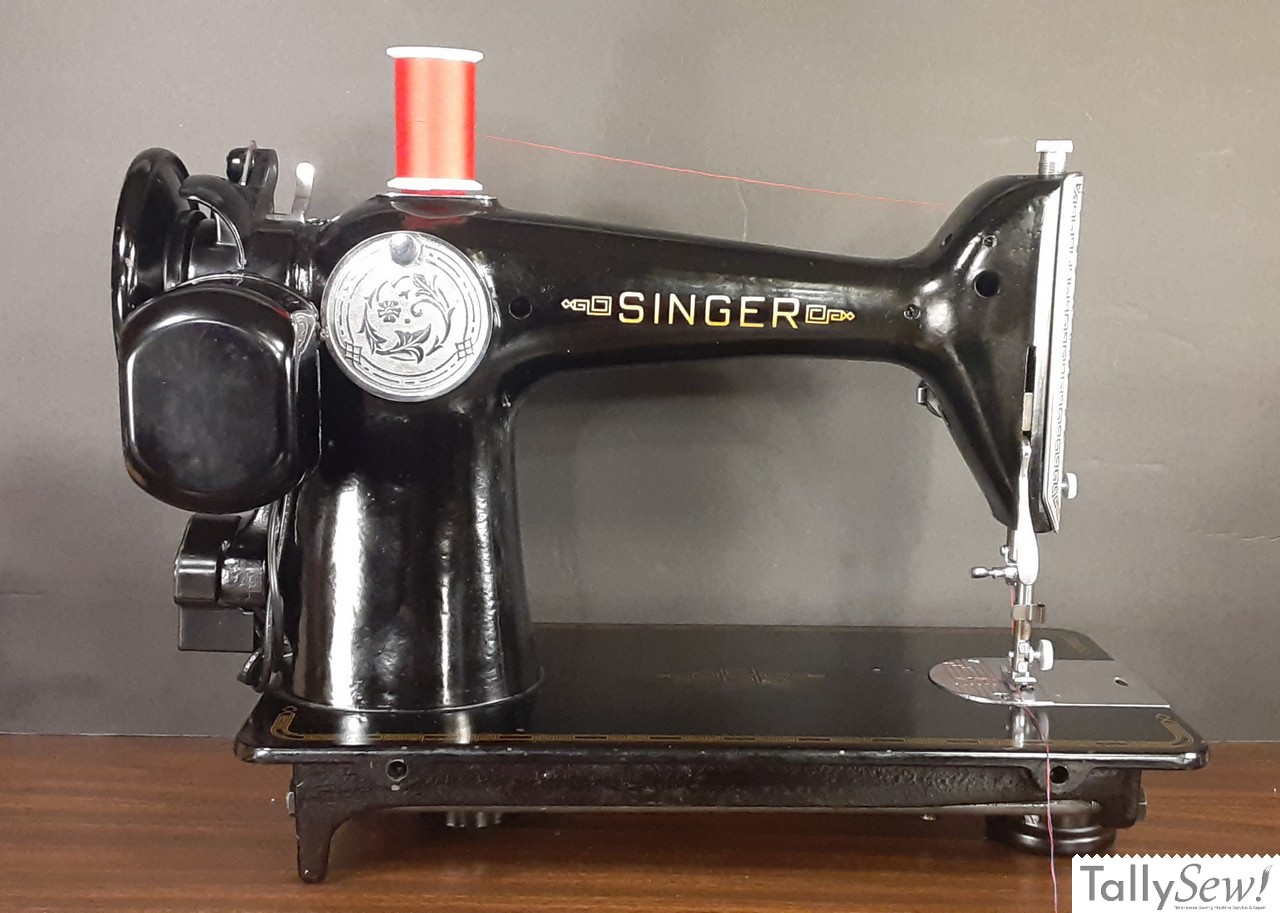 Rear view of a Singer 201-2 sewing machine, highlighting the iconic rounded housing of its direct-drive 'potted' motor.