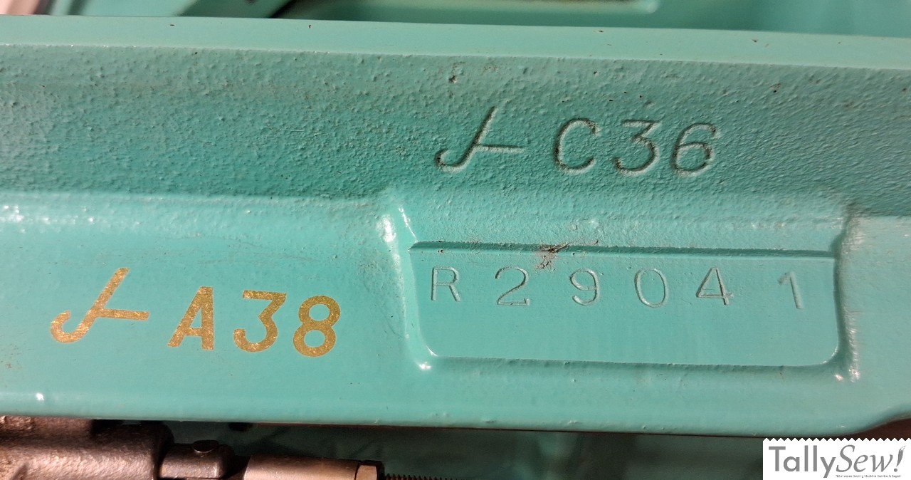 Japanese LJ mark with J-A38 inked and J-C36 cast into sewing machine bed