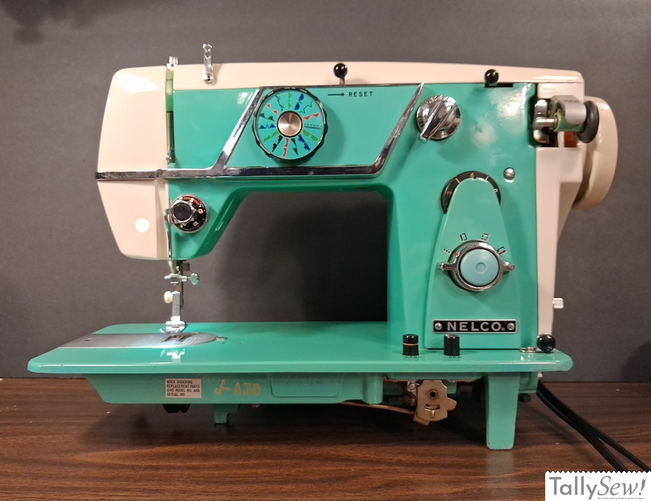 Vintage mint green Nelco R-1000 Class 15 sewing machine from the front